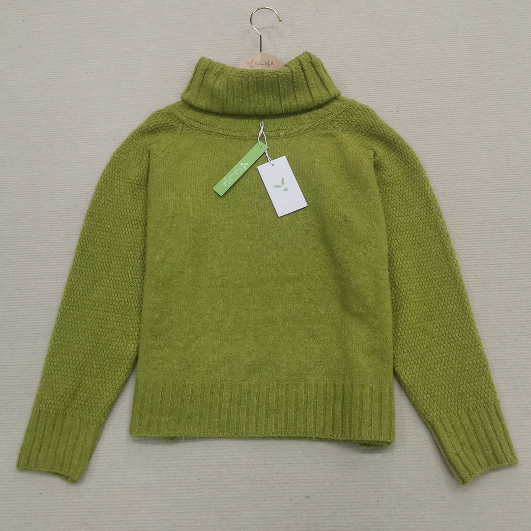 Bright green knitted oversized sweater for women, a stylish and warm fall fashion staple.