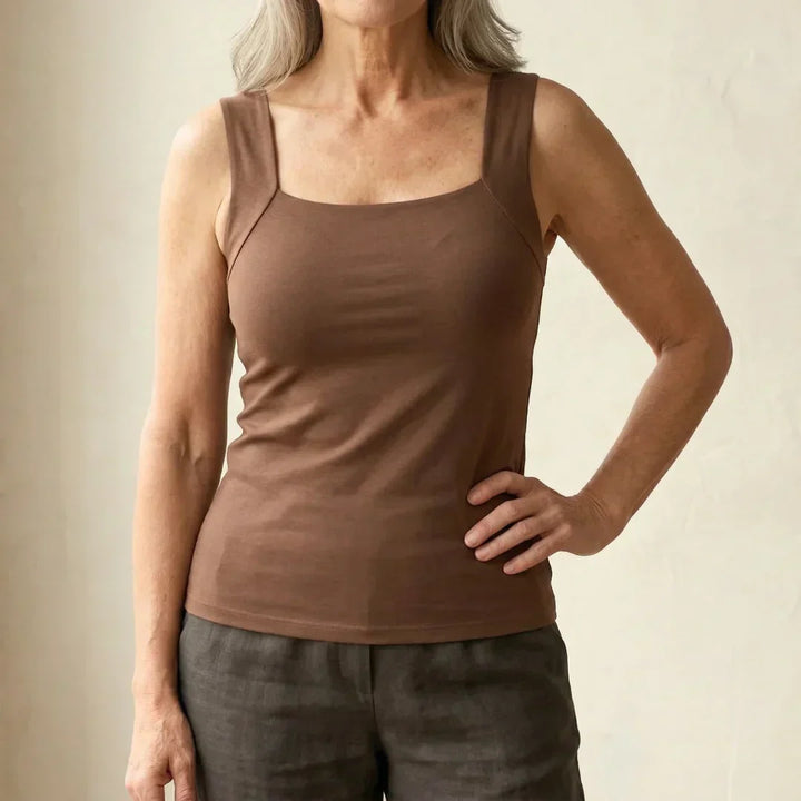 Women's built-in bra support tank top for comfortable everyday wear and versatile style.