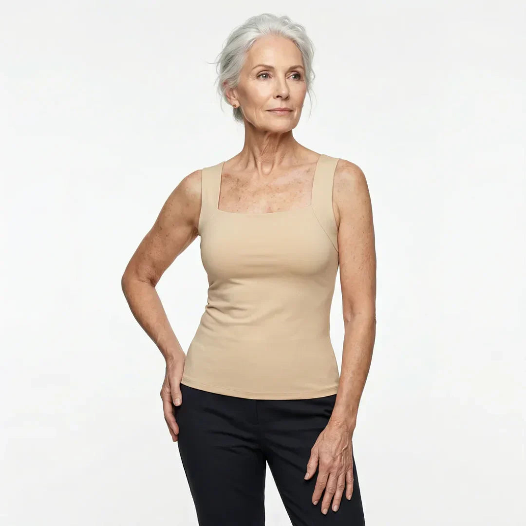 Sleek women's tank top with integrated bra offers smooth support for any occasion.
