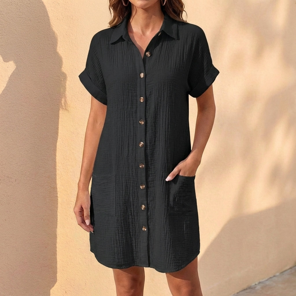 Versatile women's midi shirt dress with a stylish button-front & cuffed sleeves. Great for casual outfits.