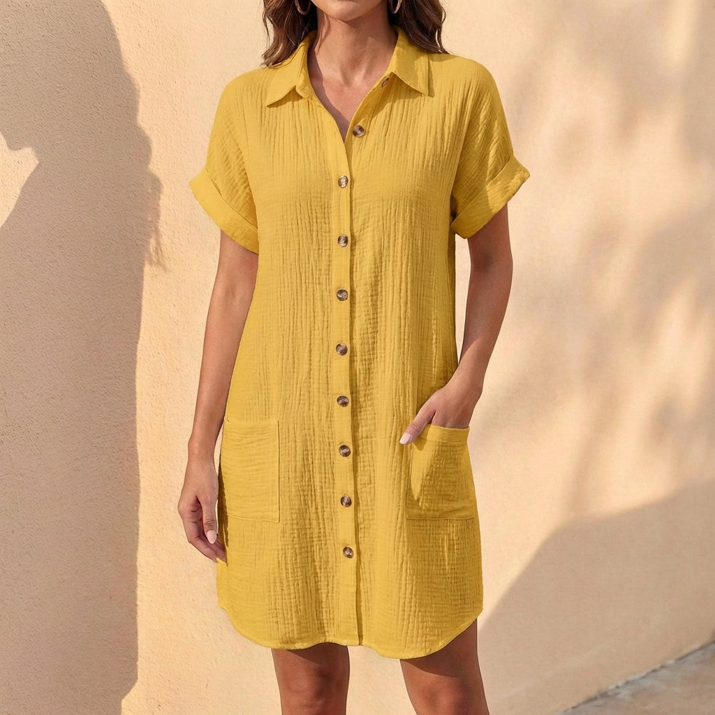 Elegant women's button-front midi shirt dress with cuffed sleeves. A comfortable and chic casual dress.