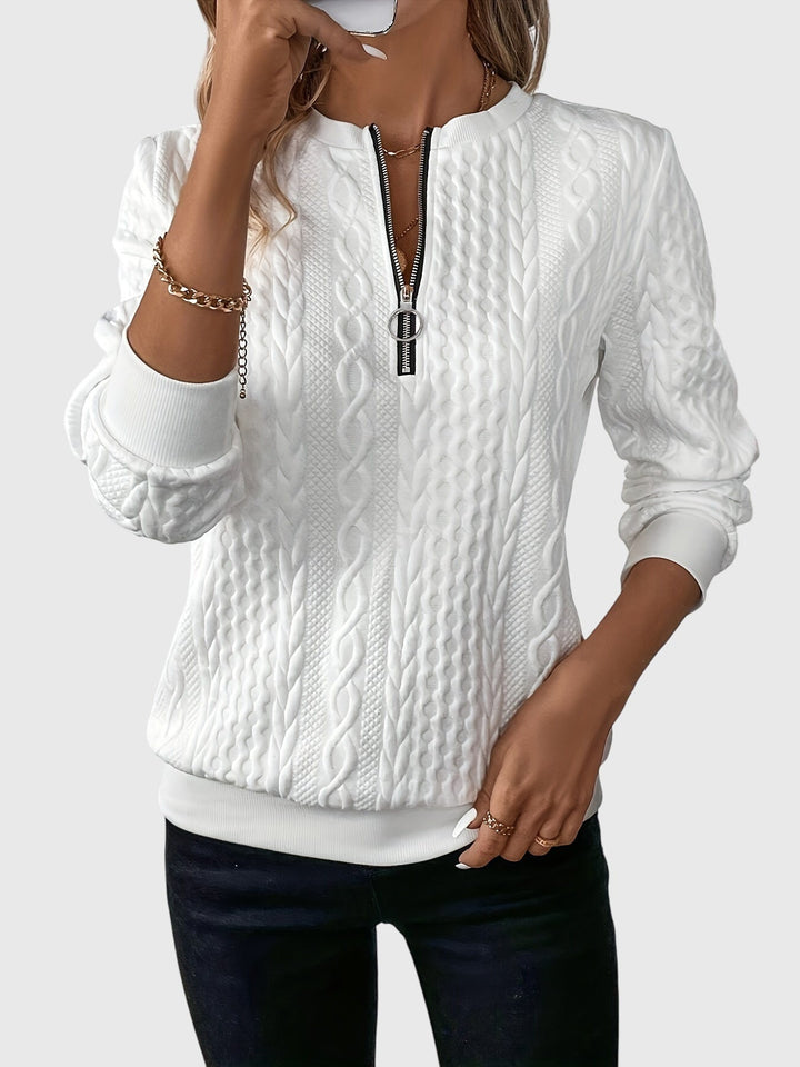 Women's cable knit quarter-zip sweater, a cozy long-sleeve pullover for fall & winter fashion.