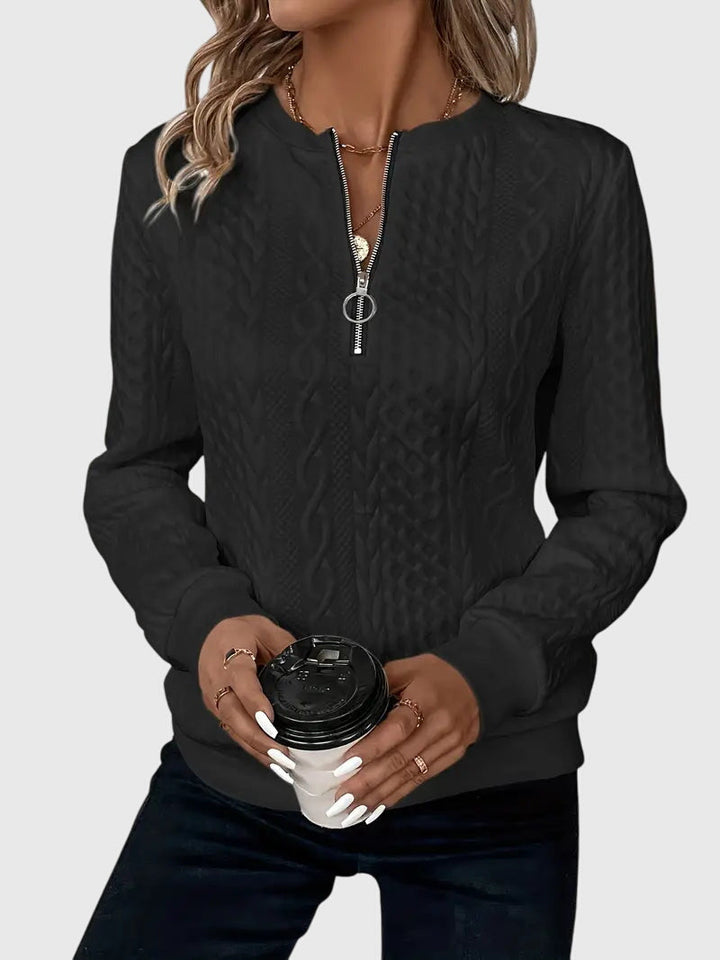 Everyday wear women's cable knit quarter-zip sweater, a versatile pullover for various occasions.