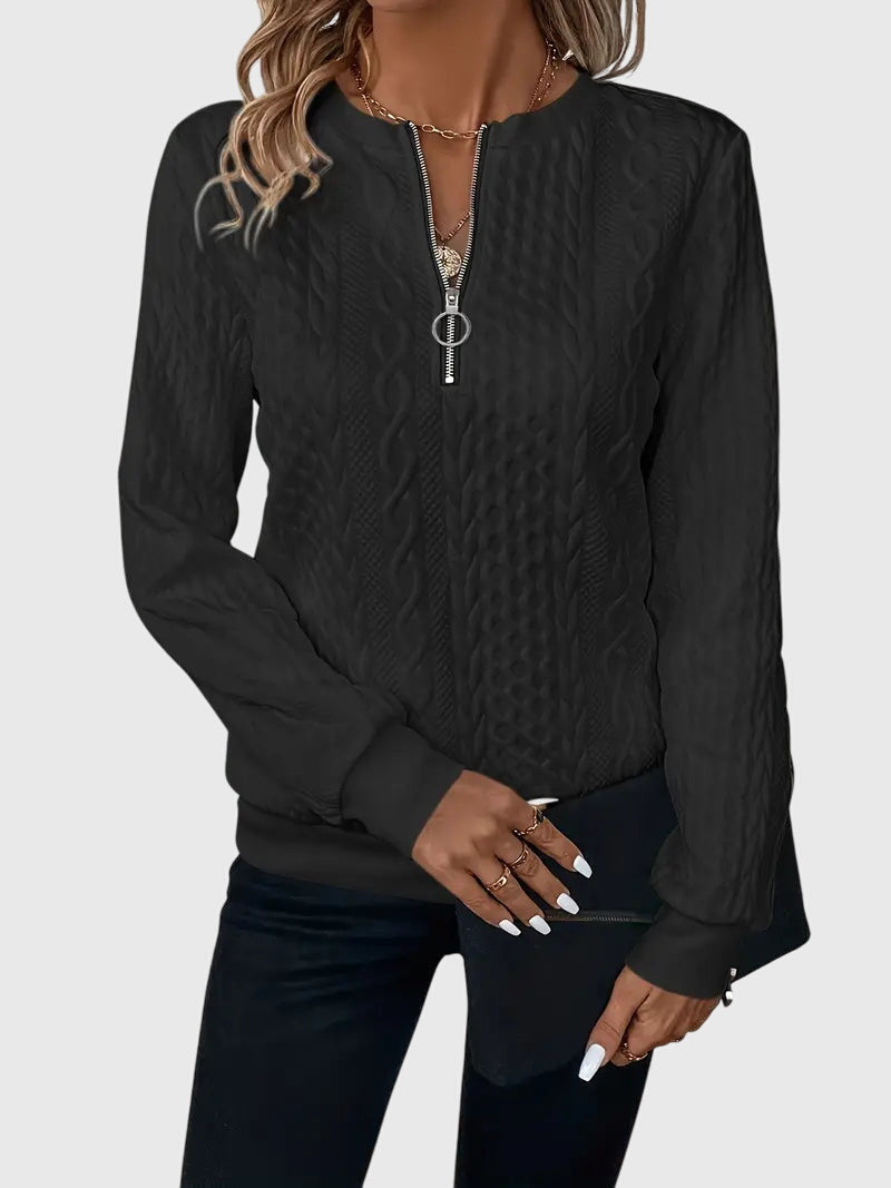 Women's structured-fit cable knit quarter-zip sweater, a polished long-sleeve for a refined look.