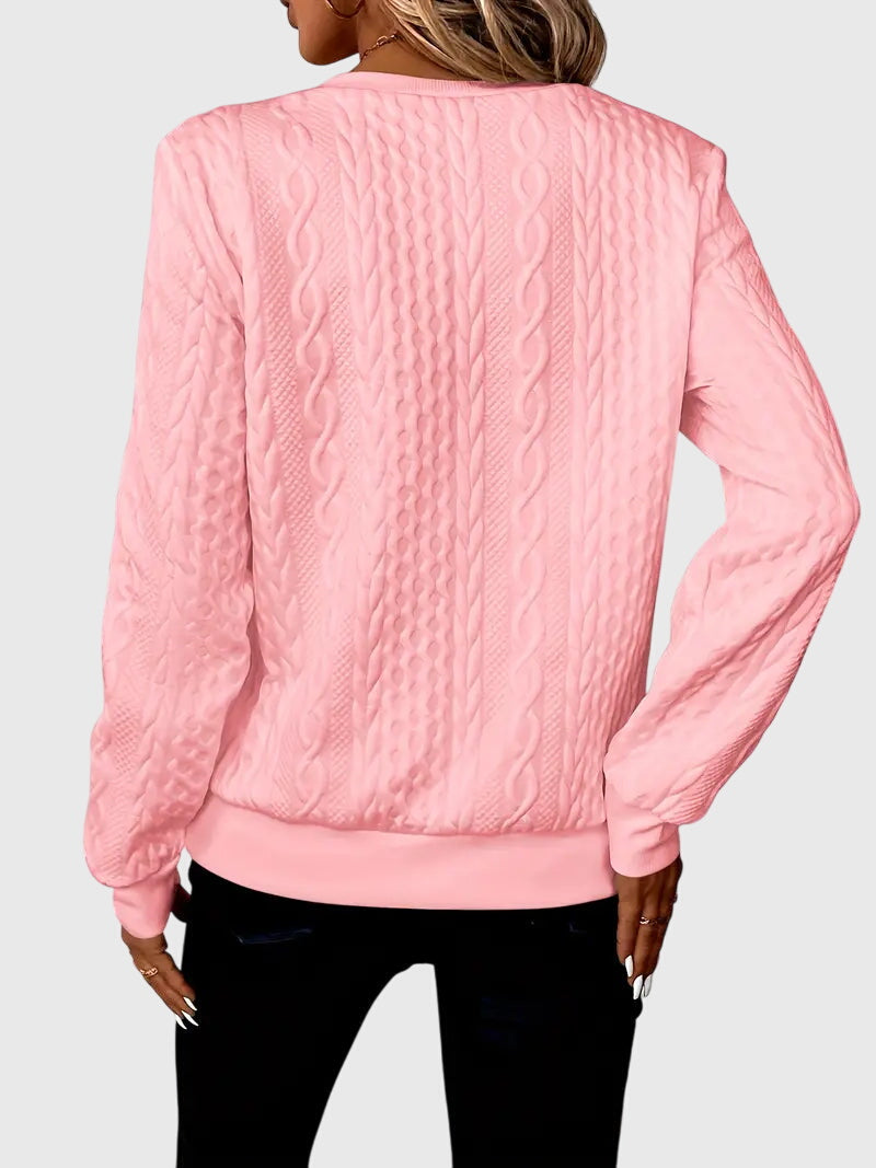 Stylish women's cable knit quarter-zip, a cozy long-sleeve sweater for elevated comfort & fashion.