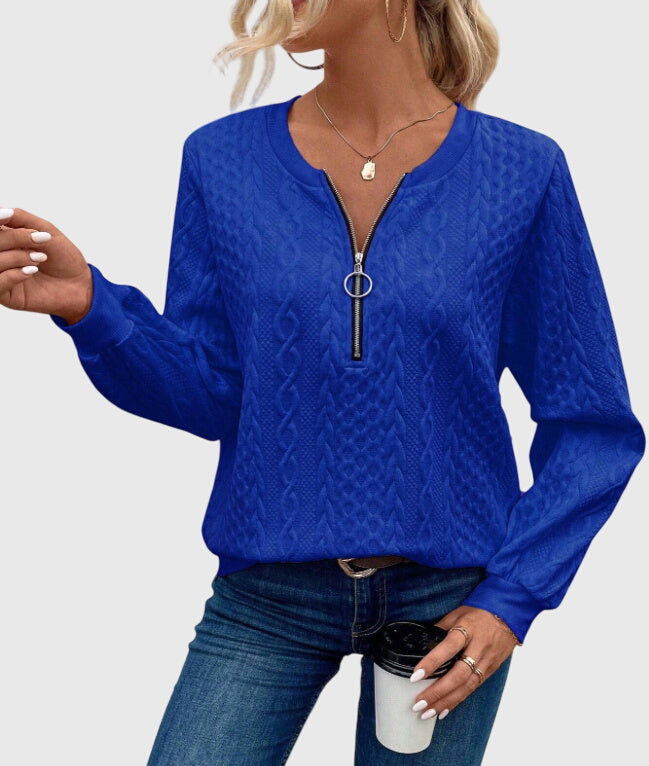 Winter essential: women's cable knit quarter-zip sweater, a warm & stylish long-sleeve option.