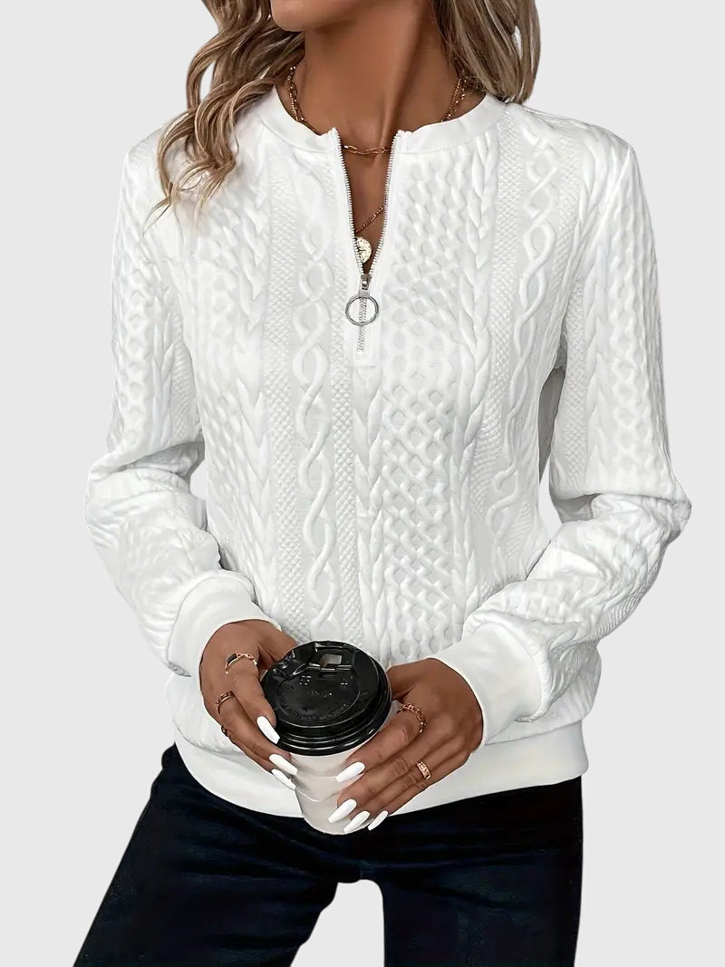 Cozy women's cable knit quarter-zip pullover, a warm and stylish option for cool weather.