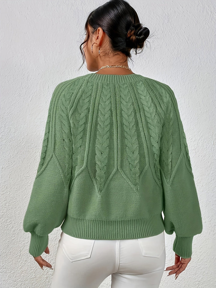 Women's cable knit sweater, relaxed fit, stylish lantern sleeves. Perfect for cozy fall fashion.