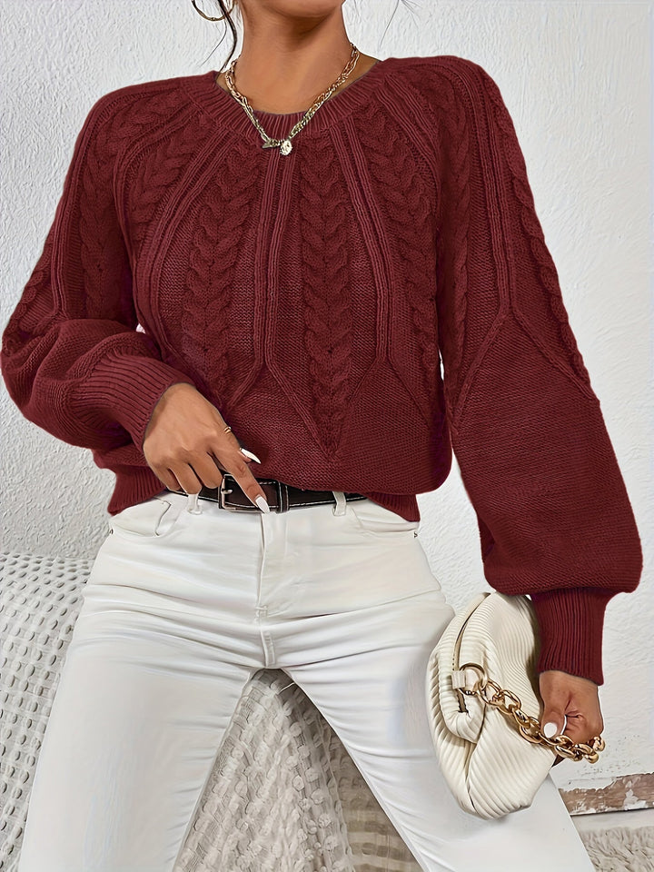 Women's cozy cable knit sweater, relaxed fit, beautiful lantern sleeves. Essential for cold weather.