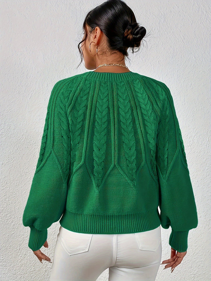 High-quality women's cable knit sweater, relaxed fit, elegant lantern sleeves. Premium winter fashion.