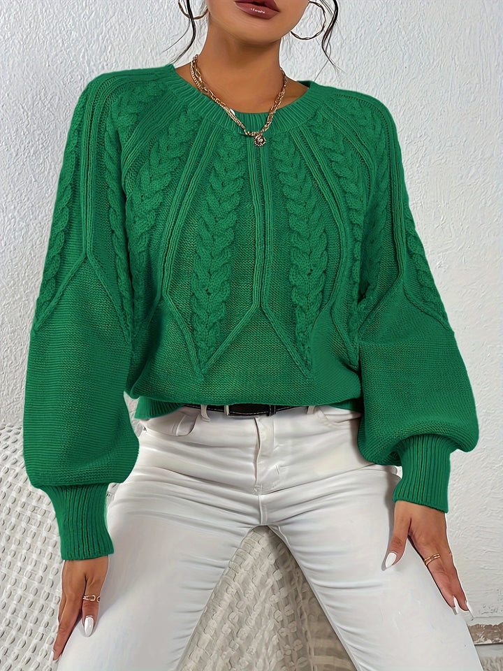 Relaxed fit women's cable knit sweater with charming lantern sleeves. Embrace cozy fall vibes.