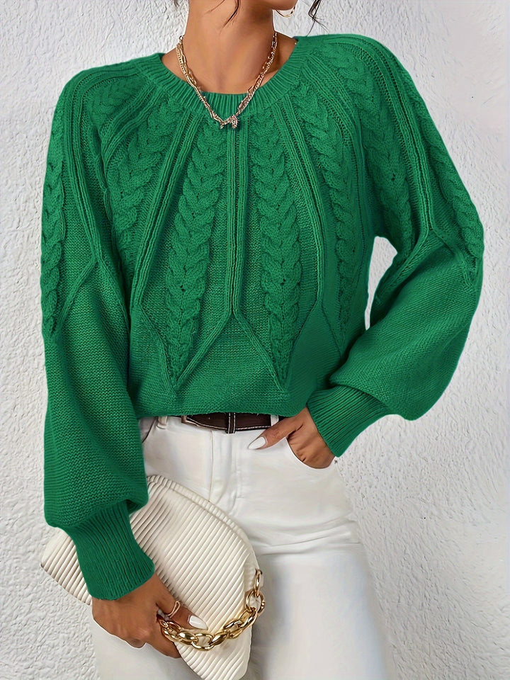 Oversized women's cable knit sweater, relaxed fit, fashion-forward lantern sleeves. Stay warm in style.
