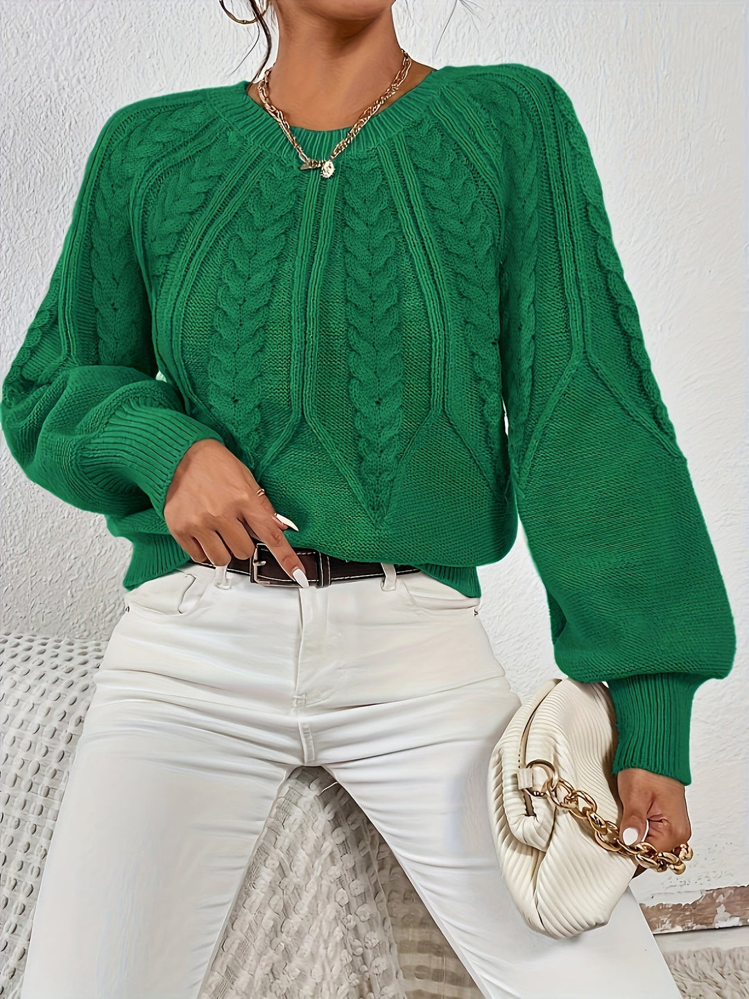 Women's winter cable knit sweater, relaxed fit, unique lantern sleeves. A must-have for cold days.