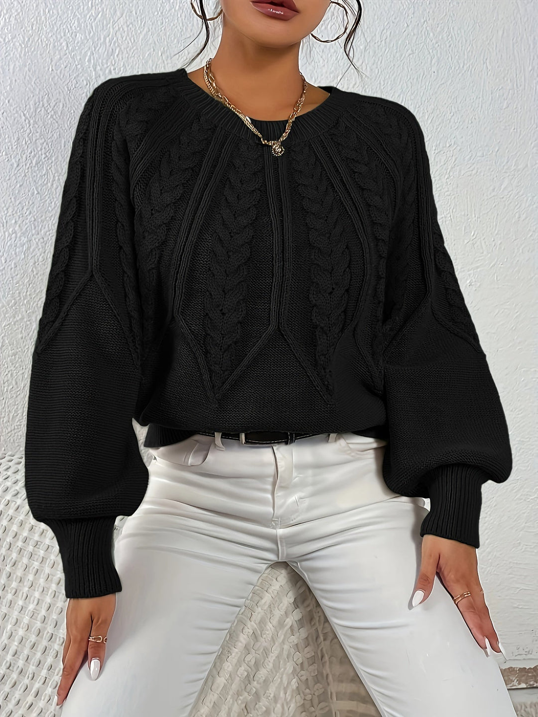 Women's warm cable knit sweater, relaxed fit, elegant lantern sleeves. Ideal for layering in winter.