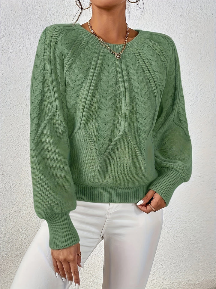 Chic oversized cable knit sweater for women, featuring trendy lantern sleeves and a relaxed fit.