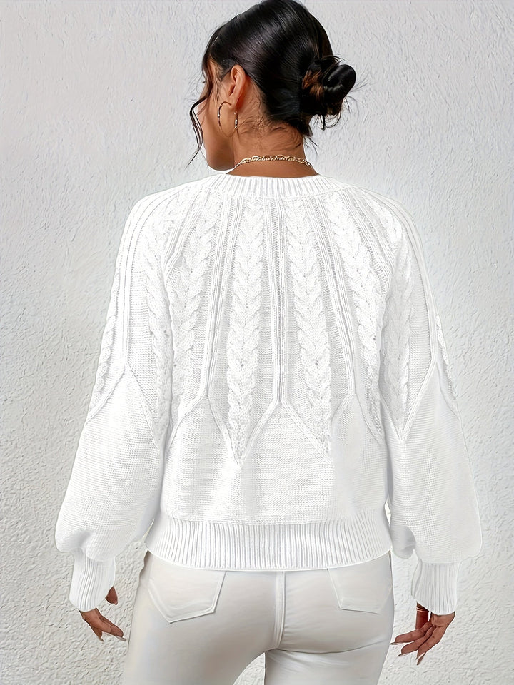 Women's oversized cable knit sweater, relaxed fit, unique lantern sleeves. Trendy and comfortable.