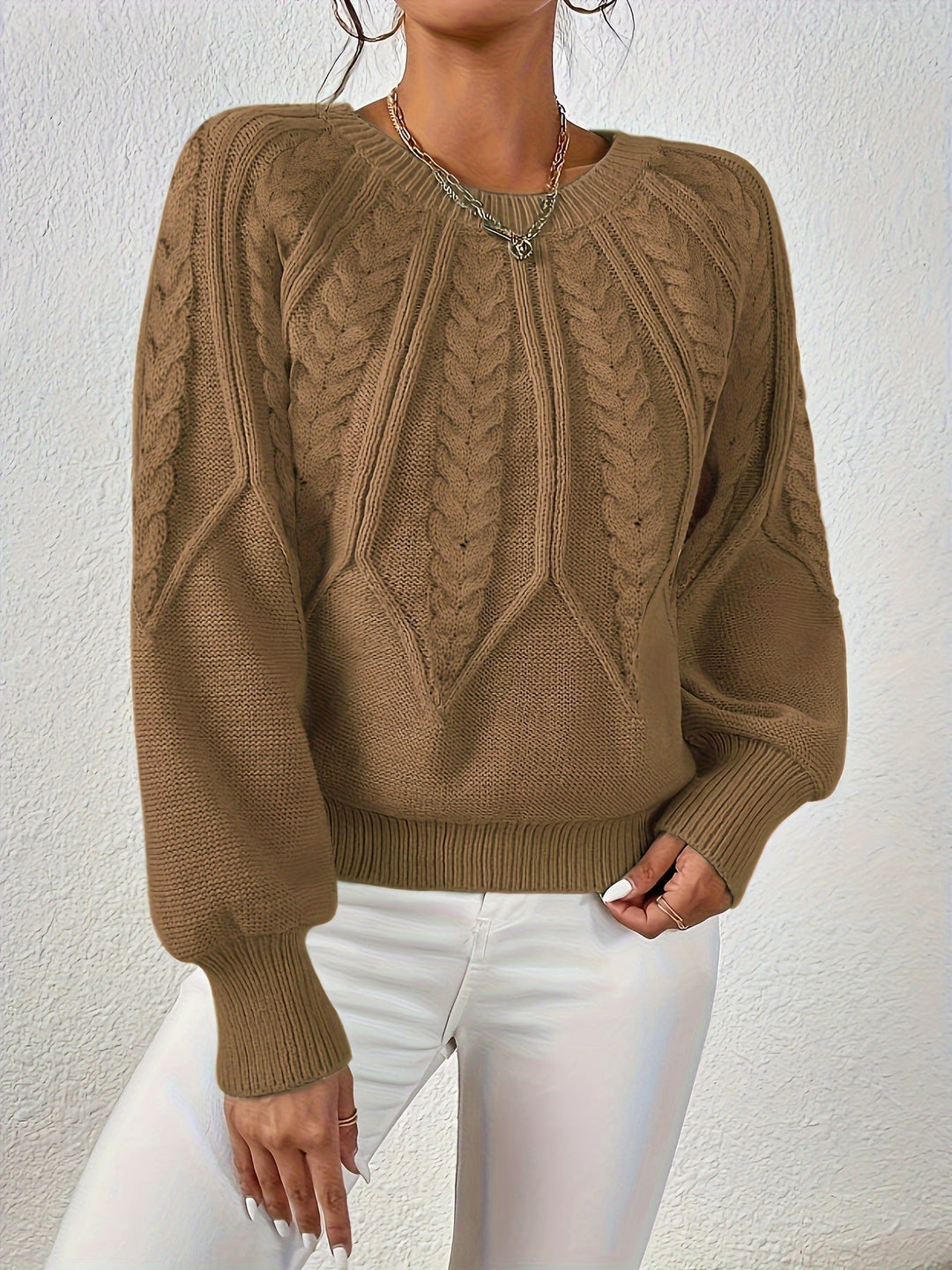 Women's versatile cable knit sweater, relaxed fit, charming lantern sleeves. Great for many occasions.