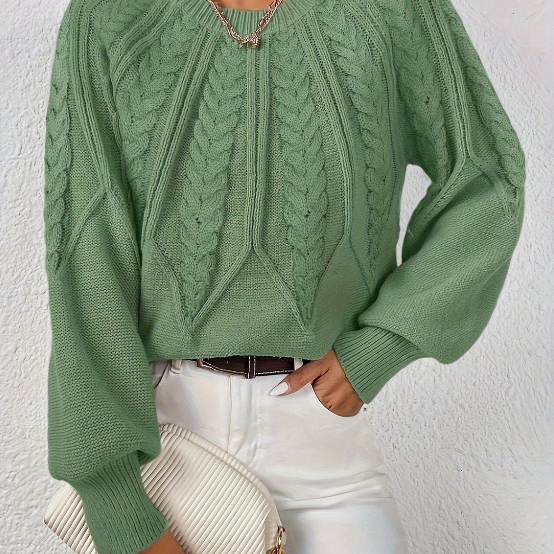 Women's luxurious cable knit sweater, relaxed fit, voluminous lantern sleeves. Feel soft and cozy.
