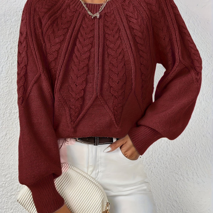 Women's sophisticated cable knit sweater, relaxed fit, graceful lantern sleeves. Chic for any event.