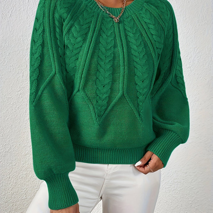 Women's warm, oversized cable knit sweater, relaxed fit, fashionable lantern sleeves. Ultimate comfort.