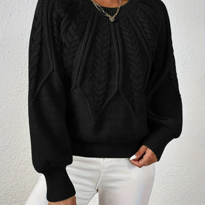 Women's cable knit sweater with unique lantern sleeves, relaxed fit. Perfect for a fashionable look.