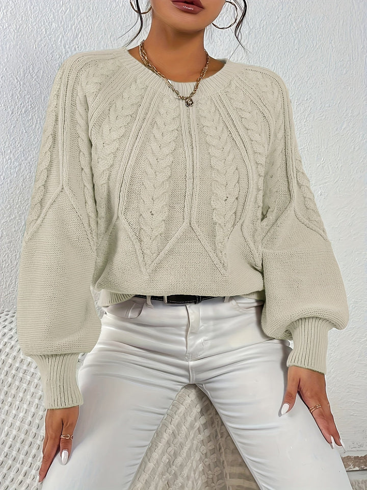 Classic women's cable knit sweater, relaxed fit, lantern sleeves. Versatile for chic fall outfits.