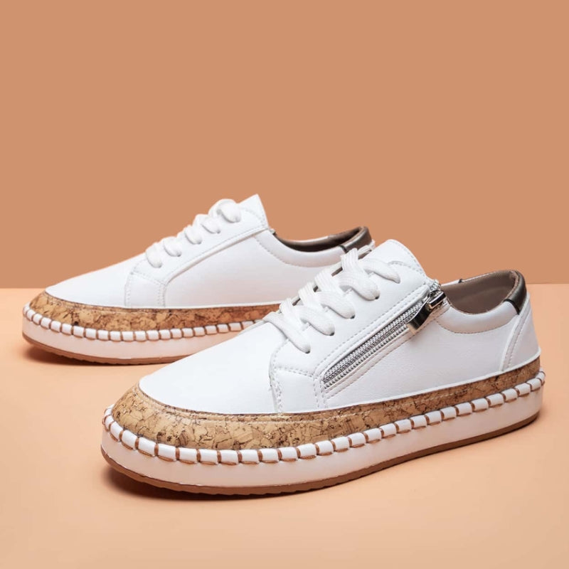 Zip-side Cali orthopedic sneakers for women, offering easy wear and foot wellness. Stylish & comfortable.