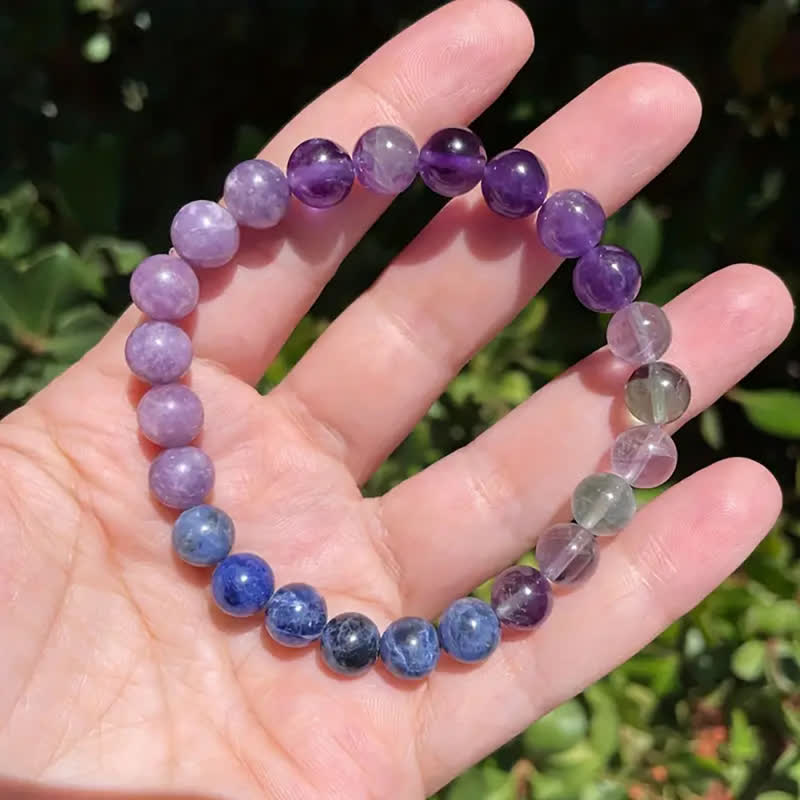 Women's calming amethyst & lapis lazuli gemstone bracelet, perfect for stress relief & spiritual balance.