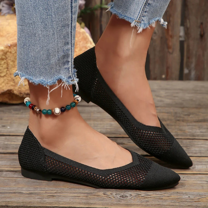 Comfortable women's Calora flats with breathable material & pointed toe, great for walking all day.