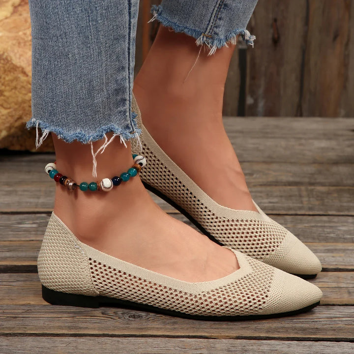 Women's Calora pointed-toe flats, comfortable slip-ons for stylish everyday walking and versatile wear.