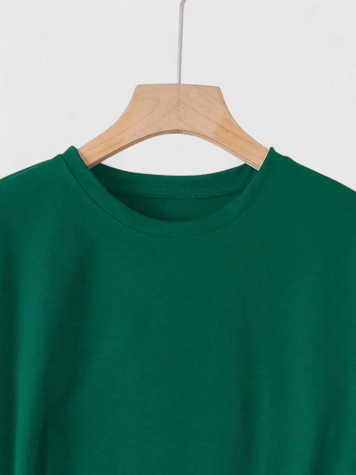 Green women's short sleeve t-shirt with a unique heart graphic, comfortable and a casual essential.