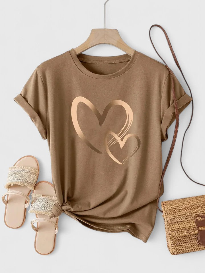 Apricot women's short sleeve t-shirt with a lovely heart graphic, a comfortable and stylish casual piece.