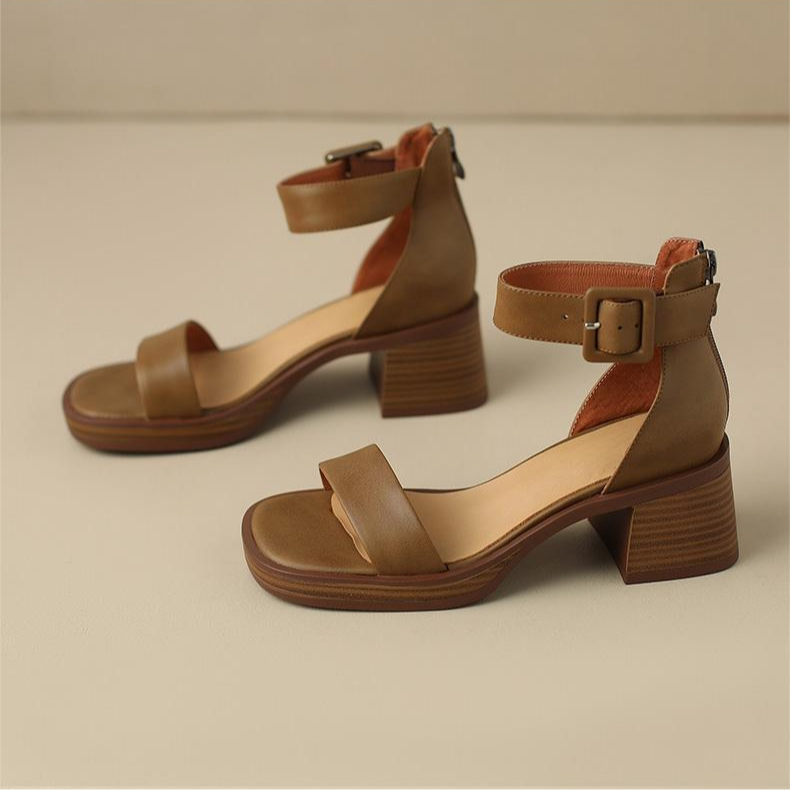 Stylish women's Carina heels featuring a block heel, secure ankle strap & reliable non-slip sole.