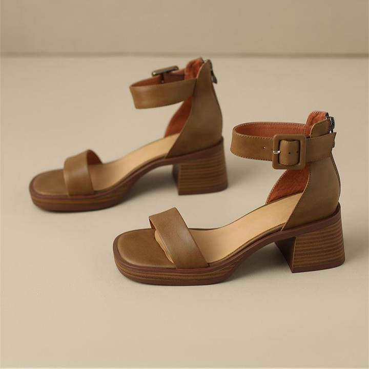 Stylish women's Carina heels featuring a block heel, secure ankle strap & reliable non-slip sole.