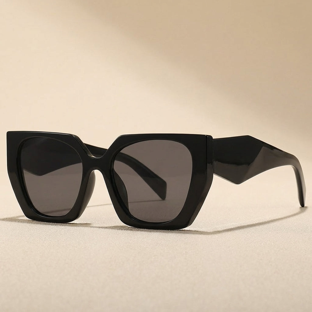 Chic beige oversized cat eye sunglasses for women. Modern fashion eye protection with UV400 lenses.