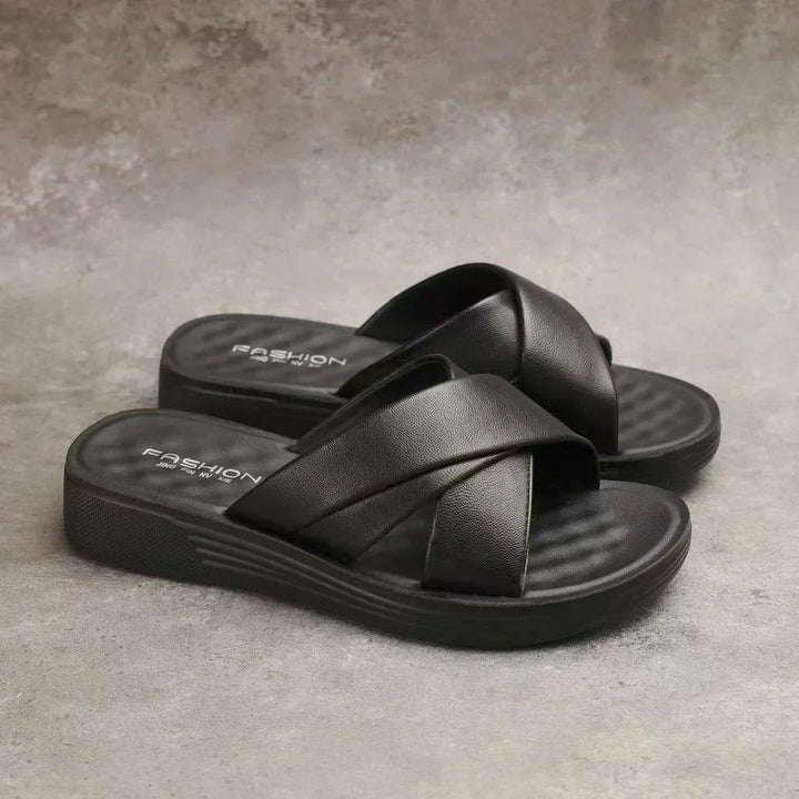 Casual women's open-toe wedge sandals by Cassy, featuring a fashionable leatherette finish