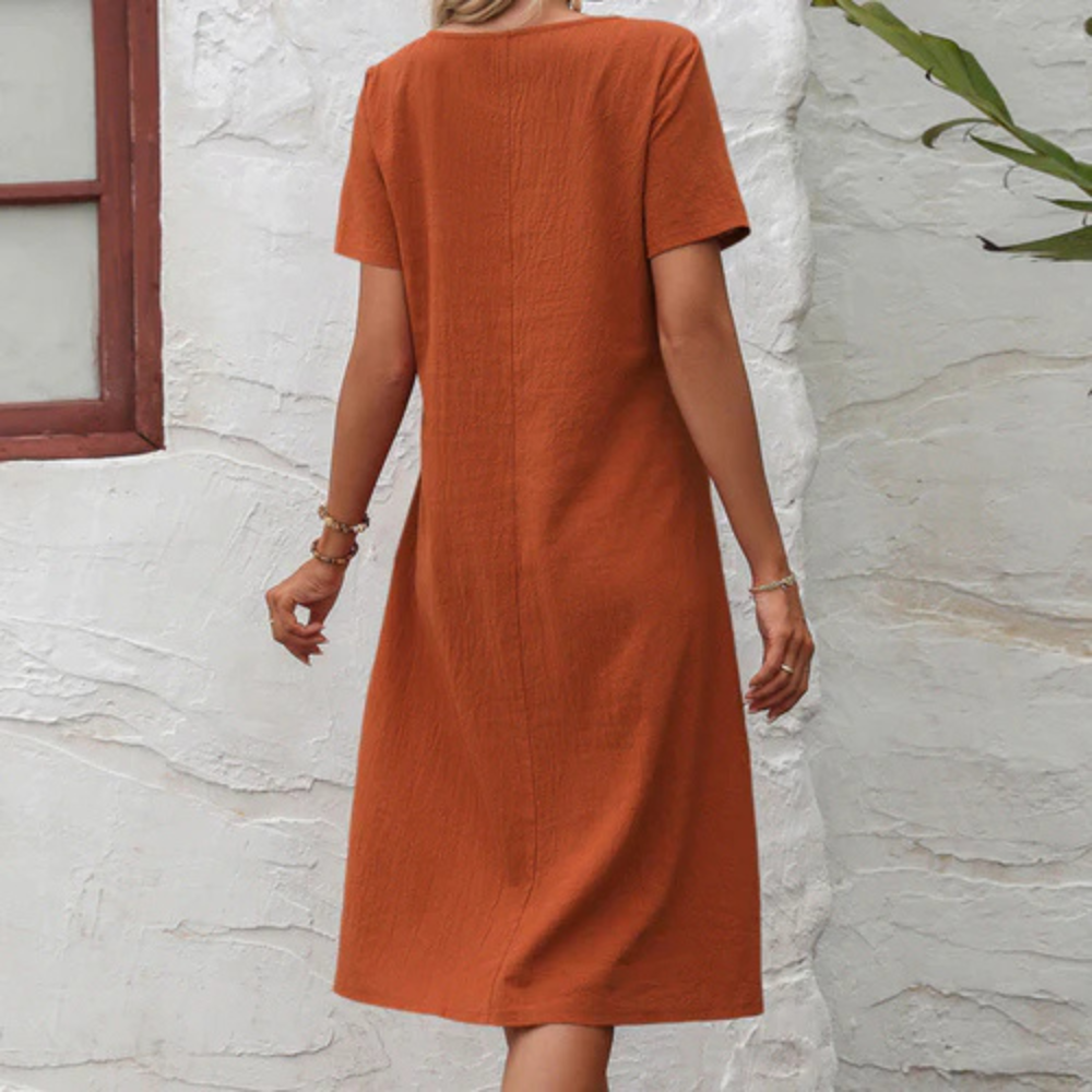 Lightweight, airy women's summer dress, Mira, offering comfortable, flowy style for casual wear & vacations.