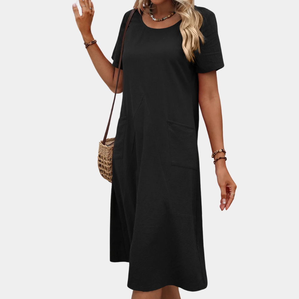 Sleeveless, flowy Mira summer dress for women, designed for airy comfort & casual style on warm days.
