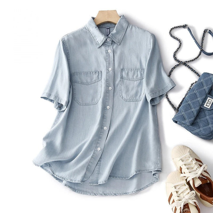 Stylish women's blue utility button-up shirt, long sleeve, ideal for versatile casual fashion.