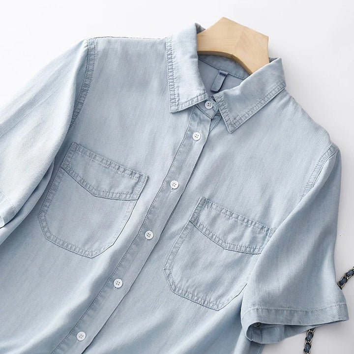 Effortless women's blue long sleeve casual button-up shirt, comfortable for everyday versatility.