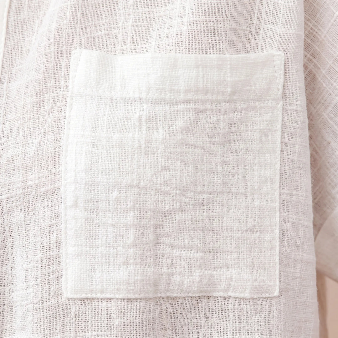 Comfortable women's button-down shirt, a versatile casual top for everyday wear and summer style.
