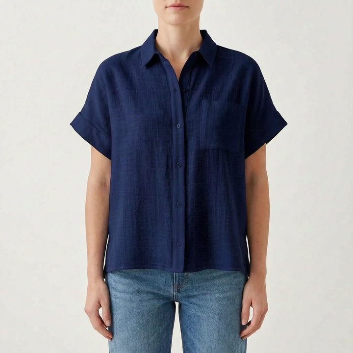 Front view of a women's casual short sleeve button-down shirt, embodying relaxed summer style.