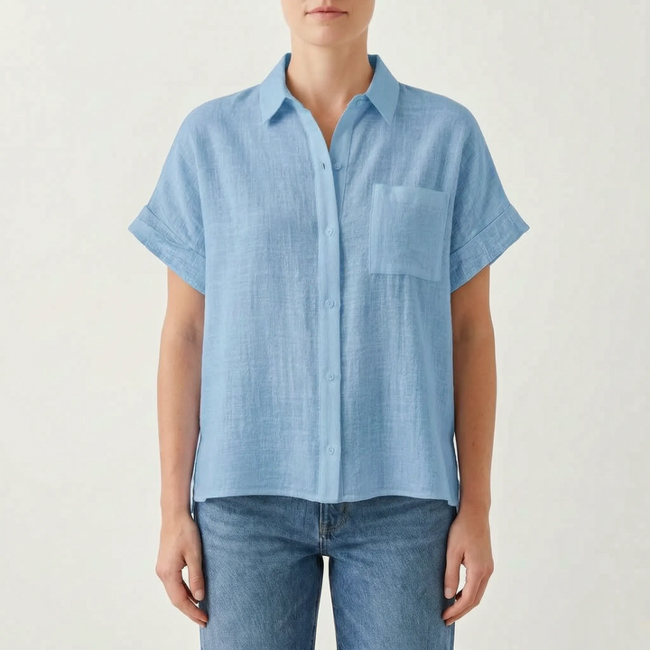 Casual women's short sleeve button-down blouse, designed for a relaxed and cool summer fashion experience.