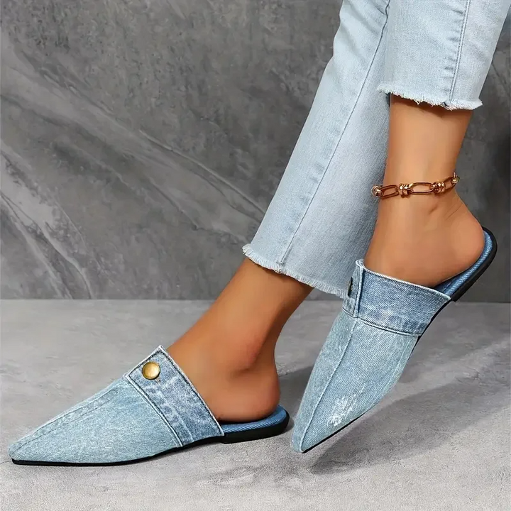 Elegant women's mule slides with pointed toe & button detail, ideal for spring/summer casual chic footwear.