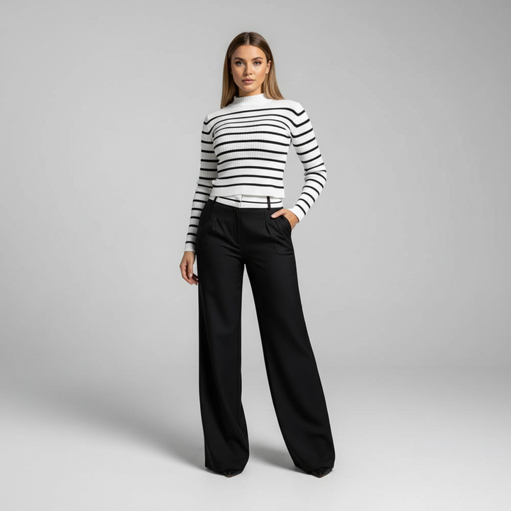 Comfortable polyester two-piece set for women, featuring a striped top and elegant wide-leg trousers.