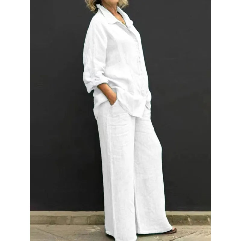 Relaxed fit women's matching set with long sleeve button-up shirt & comfortable wide-leg pants.