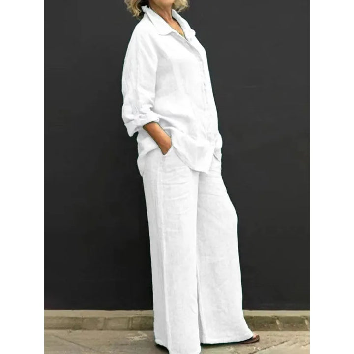 Relaxed fit women's matching set with long sleeve button-up shirt & comfortable wide-leg pants.