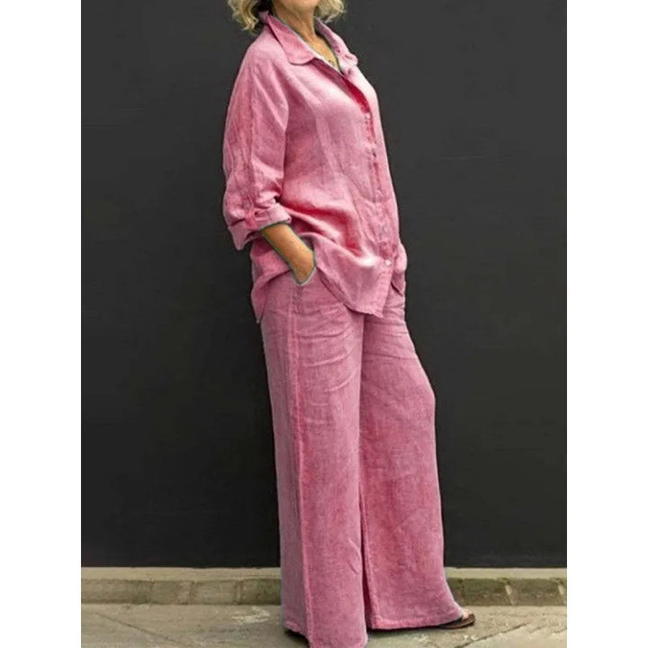 Comfortable women's loungewear set: button-front shirt and elegant wide-leg pants, perfect for relaxing.