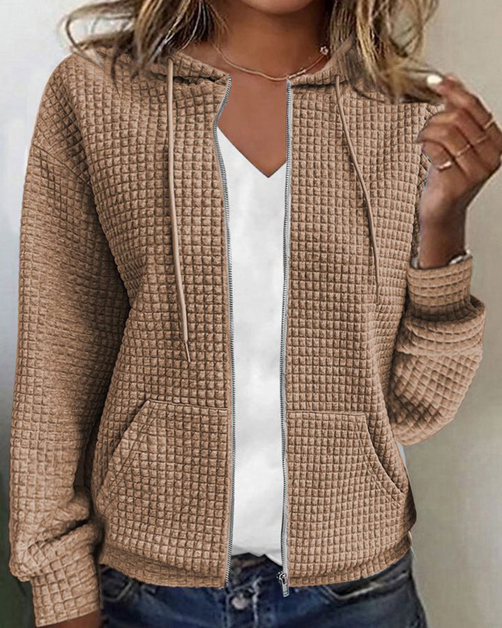 Durable women's comfort vest with functional pockets, drawstring waist, and a smooth zip closure for any season.