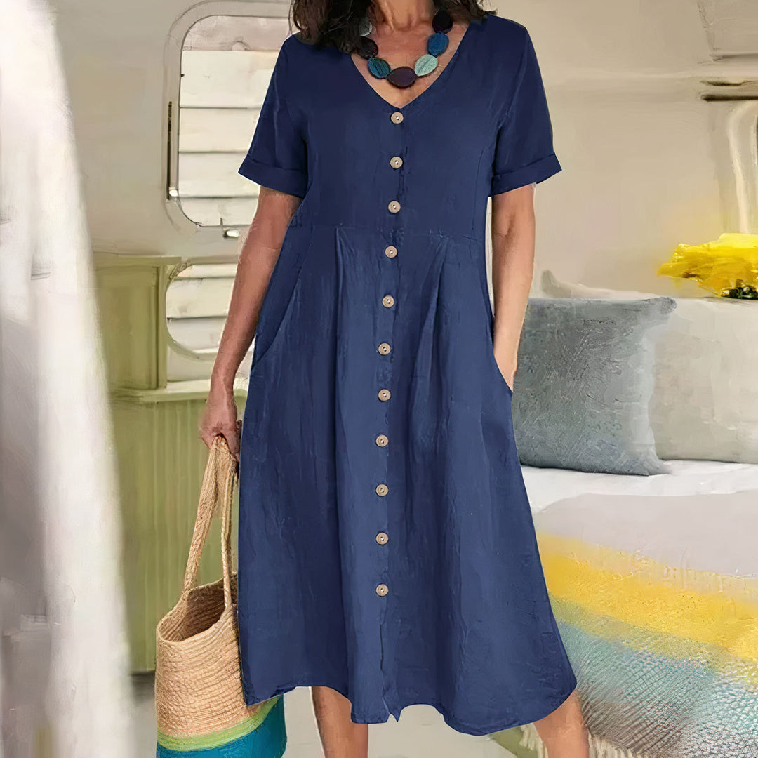 Women's comfortable loose fit midi dress in cotton blend, perfect for casual summer wear and beach outings
